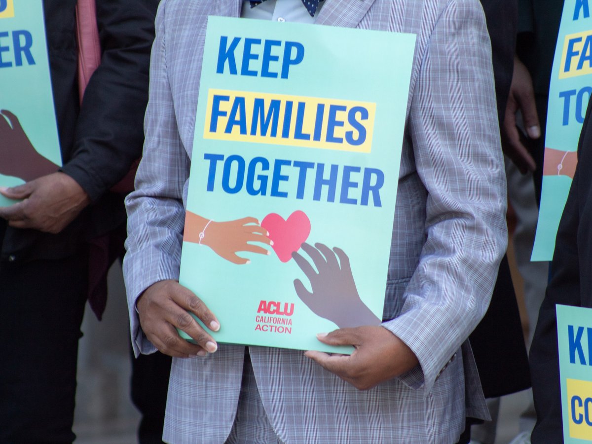 Immigration rights activists hold signs during a press conference in response to President Donald Trump’s executive orders on immigration Tuesday, Jan. 21, 2025, outside the Capitol in Sacramento.