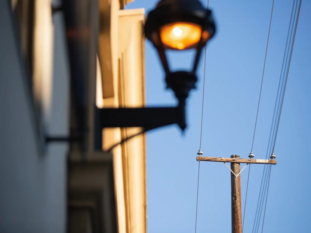 Power lines in Sacramento on Sept. 20, 2022. Electric bills include fees for utilities' return on equity, which critics say have grown excessive in California.