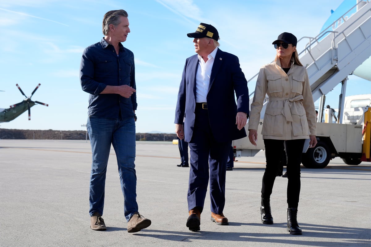President Donald Trump and first lady Melania Trump listen to California Gov. Gavin Newsom after arriving on Air Force One at Los Angeles International Airport in Los Angeles, Jan. 24, 2025.