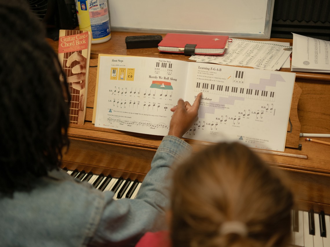 Diamond Key runs through a piano exercise with a student at Music Lab East Sacramento on Tuesday, Jan. 28. Key teaches piano and vocal lessons.