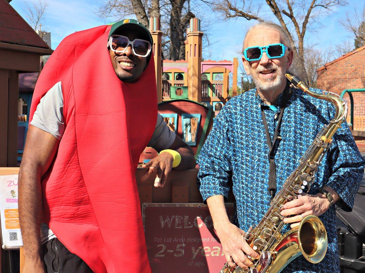 (L-R) Jerry Turner, also known as Jahri’s World, stands beside Dr. Paul D’ Blue who plays the saxophone after a live show at McKinley Park in Sacramento on Thursday, Feb. 20, 2025.