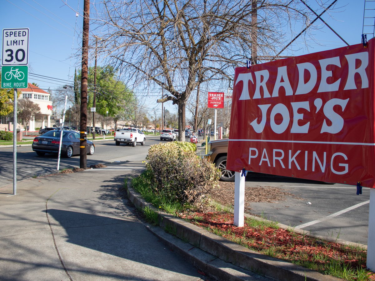 Cars drive by Trader Joe’s reopened auxiliary parking lot Friday, Feb. 28, 2025 at the old Burr’s Fountain location at 4920 Folsom Blvd. in Sacramento.