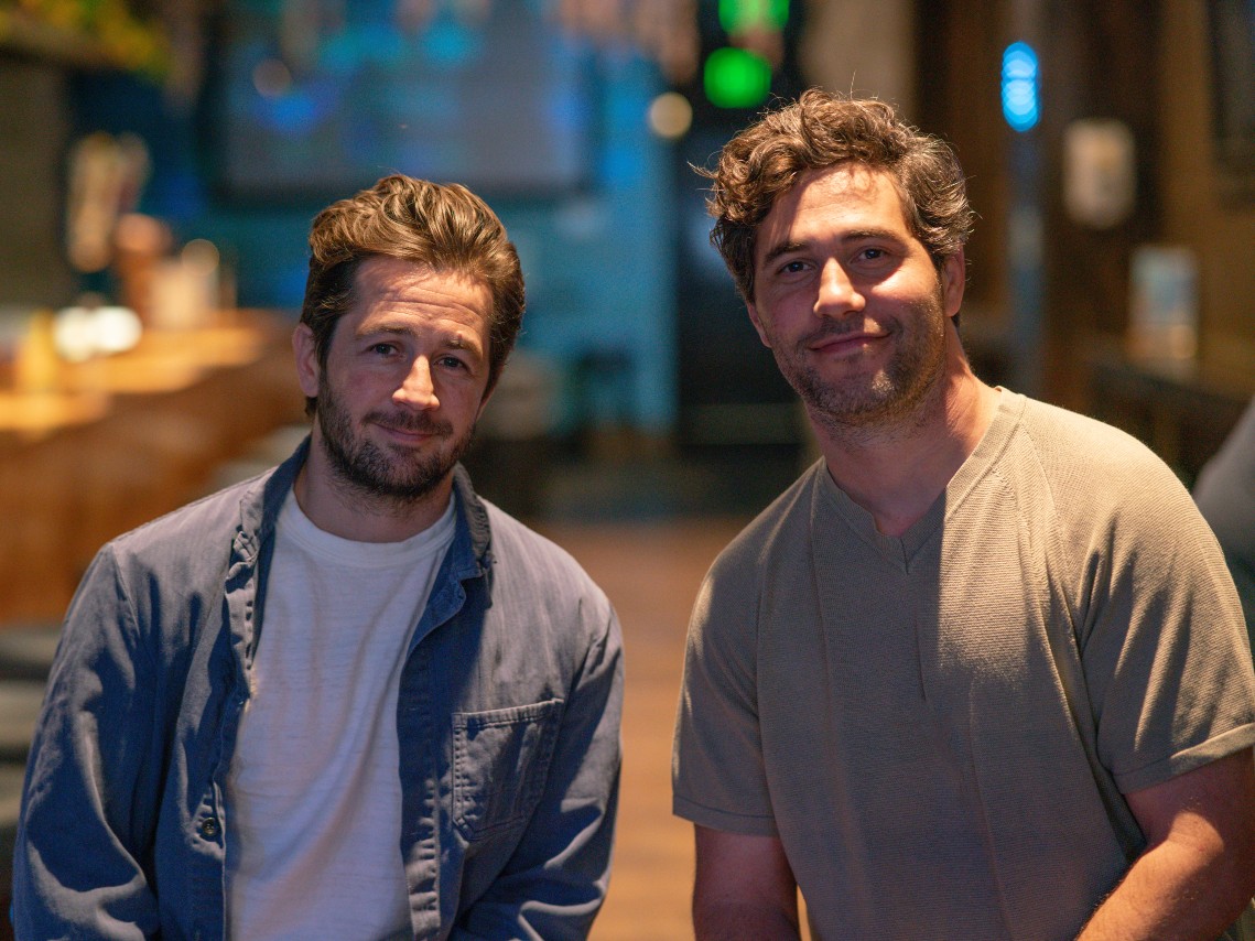 “Sacramento” director, lead actor and co-writer Michael Angarano (left) and co-writer Chris Smith in Dive Bar on K Street on Wednesday, April 9. Dive Bar is one of a handful of Sacramento locations featured in the film, premiering April 11.