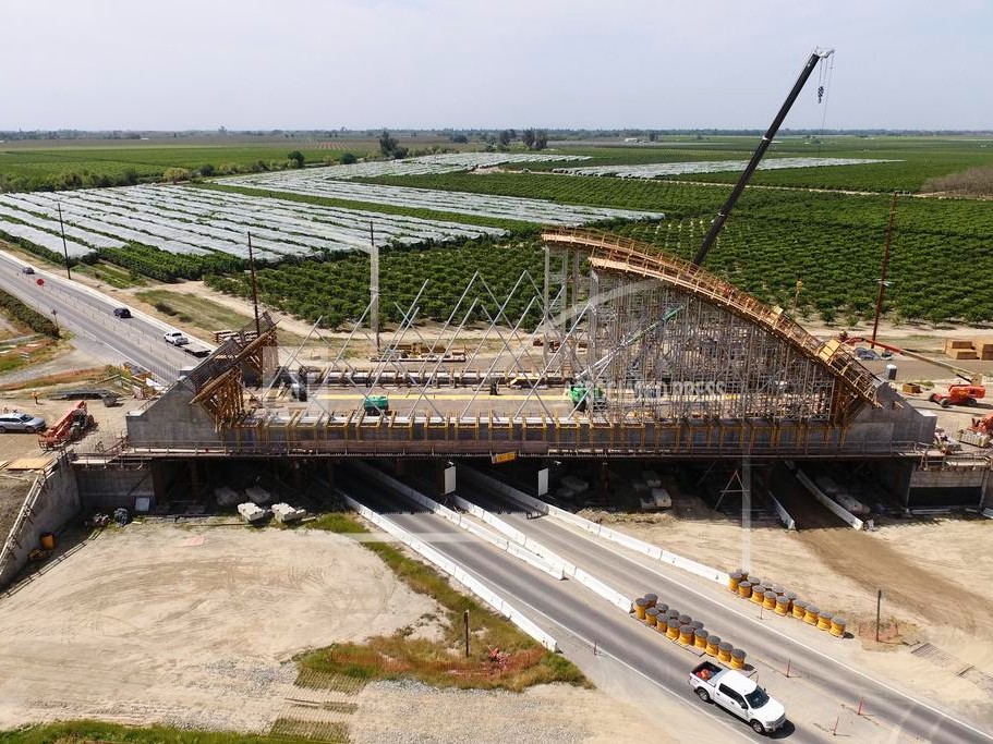 The Tied Arch Bridge construction site, which will take high-speed trains over State Route 43, is shown in an aerial view Tuesday, April 15, 2025, in Fresno County, Calif.