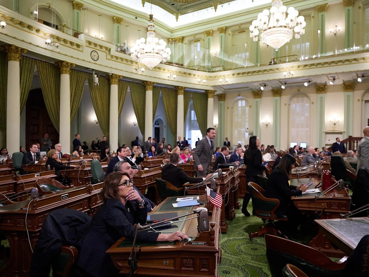 Assemblymembers watch the results of a vote during an Assembly floor session at the state Capitol in Sacramento on March 13, 2025.