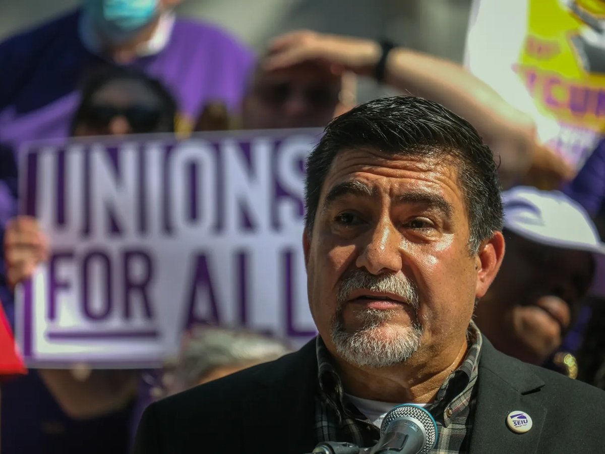 David Huerta, president of SEIU California speaks outside City Hall in Los Angeles during a protest to condemn the racist comments made in a 2021 by Los Angeles City Councilmembers, on Oct. 18, 2022.