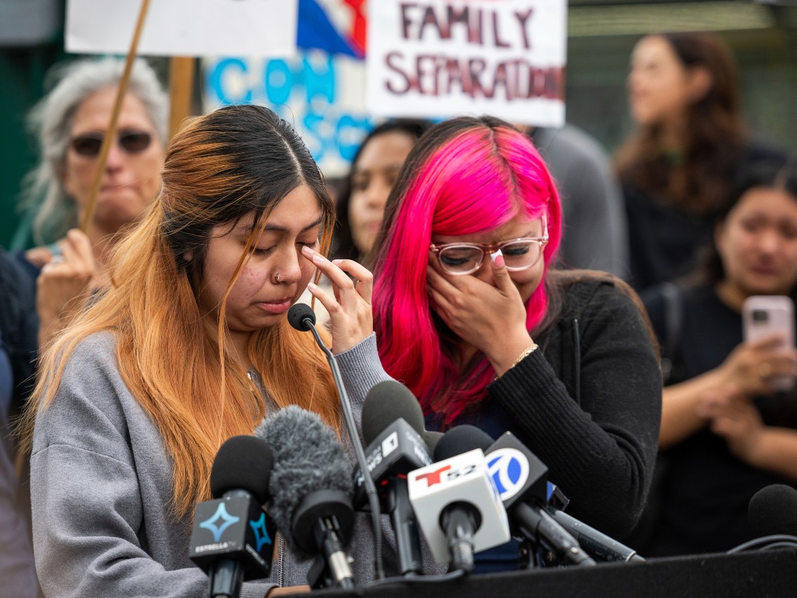 Kimberly Hernandez and her sister Jaslyn Hernandez, daughters of a car wash worker, speak during a press conference with families of detained car wash workers, Wednesday, June 11, 2025, in Culver City, Calif.