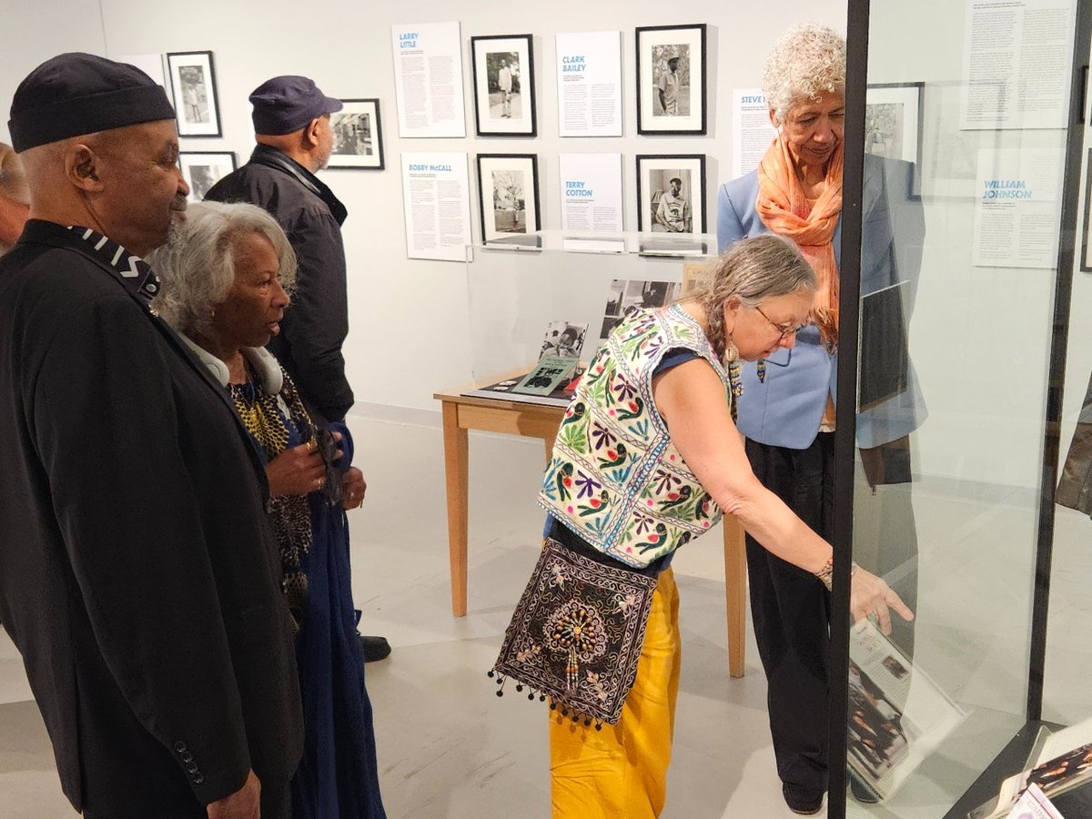 R.E. Malik Edwards (left), Kimberly Marshall (second from left), Susanna Lucia Lamaina (center) and Ericka Huggins (right) tour the new “Revolutionary Grain” exhibit at the California Museum June 14, 2025.