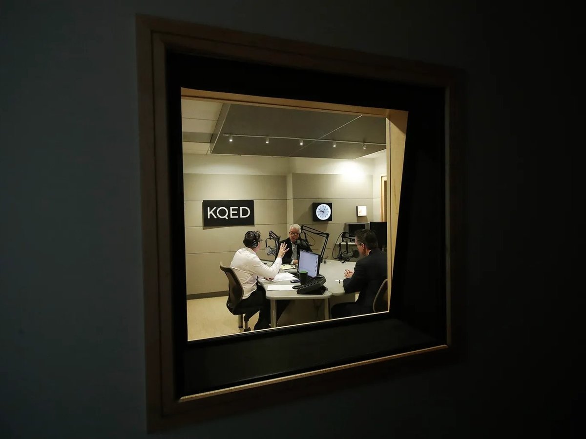 Radio host Scott Shafer, left, moderates a California gubernatorial debate between Republican candidate John Cox, center, and Democratic candidate Gavin Newsom at KQED Public Radio Studio in San Francisco, on Oct. 8, 2018.