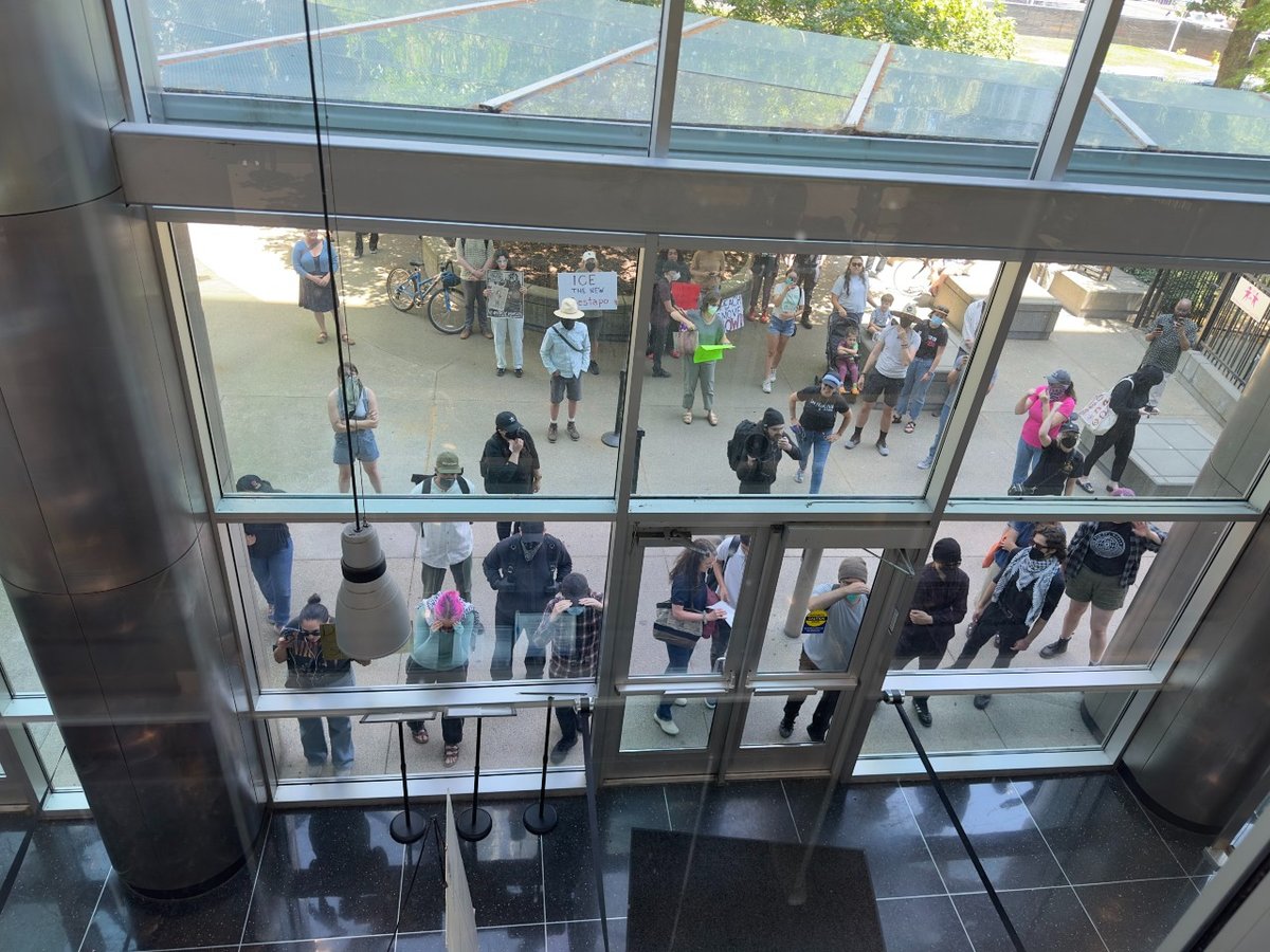 Protesters attempt to enter the John Moss Federal Building after it was placed on lockdown Thursday, June 19, 2025. Access was restricted following an immigration enforcement action that led to the detention of a man while exiting immigration court.