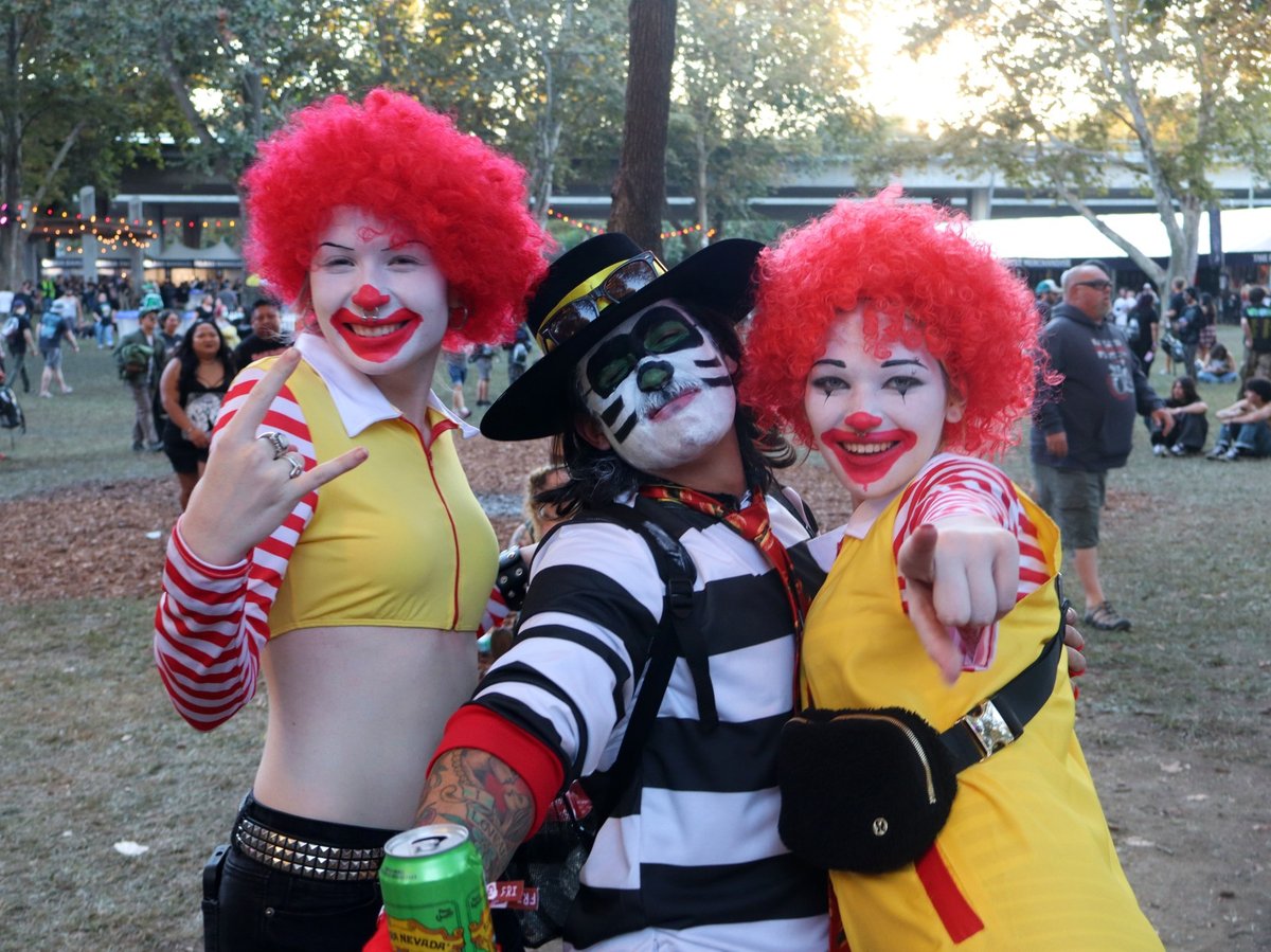 (L-R) Arabella Larke, Brandon Young, Sierra Young, dressed as Ronald McDonald and the Hamburglar attended Aftershock Friday Oct. 6, 2025.