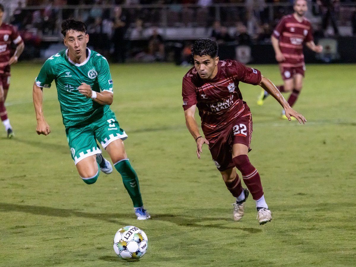 Sacramento Republic winger Michelle Benítez (right) battles Hartford Athletic defender Sebastian Anderson (left) during the 2025 USL Jägermeister Cup final at Heart Health Park Oct. 4, 2025.