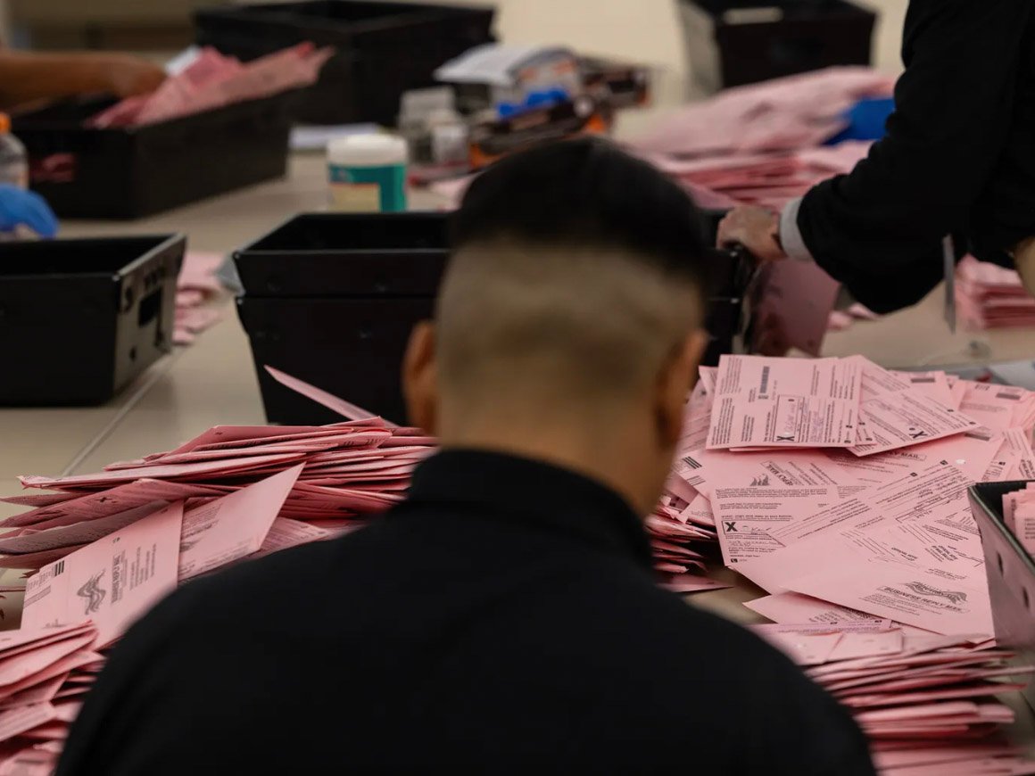 Election workers process ballots at the Sacramento County Voter Registration and Elections office in Sacramento on Nov. 5, 2024.