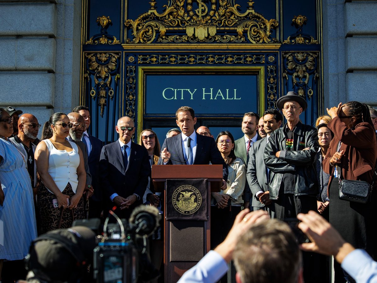 Mayor Daniel Lurie speaks at a press event in front of San Francisco City Hall on Oct. 29, 2025.