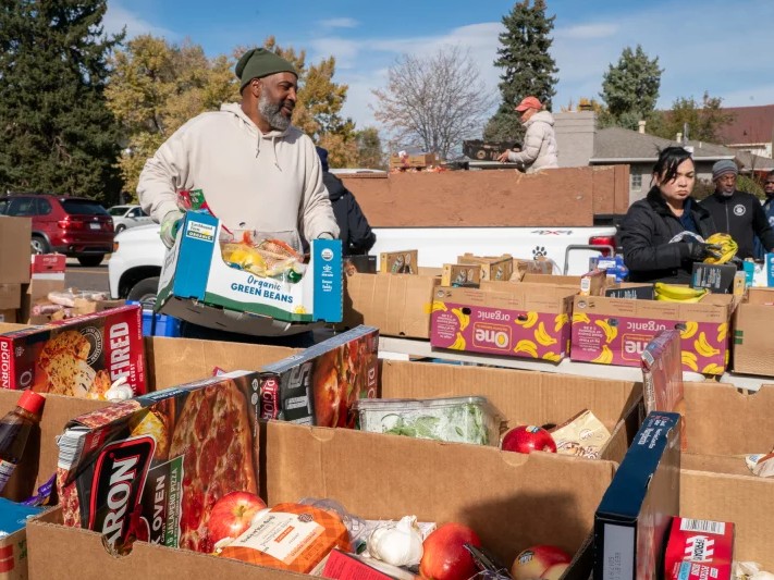 Food banks around the country are trying to pick up the slack from the pause in SNAP benefits. The courts say benefits must be restored but it is unknown when. Here, Park Hill Food Pantry volunteers in Denver work to fill the need on Friday.