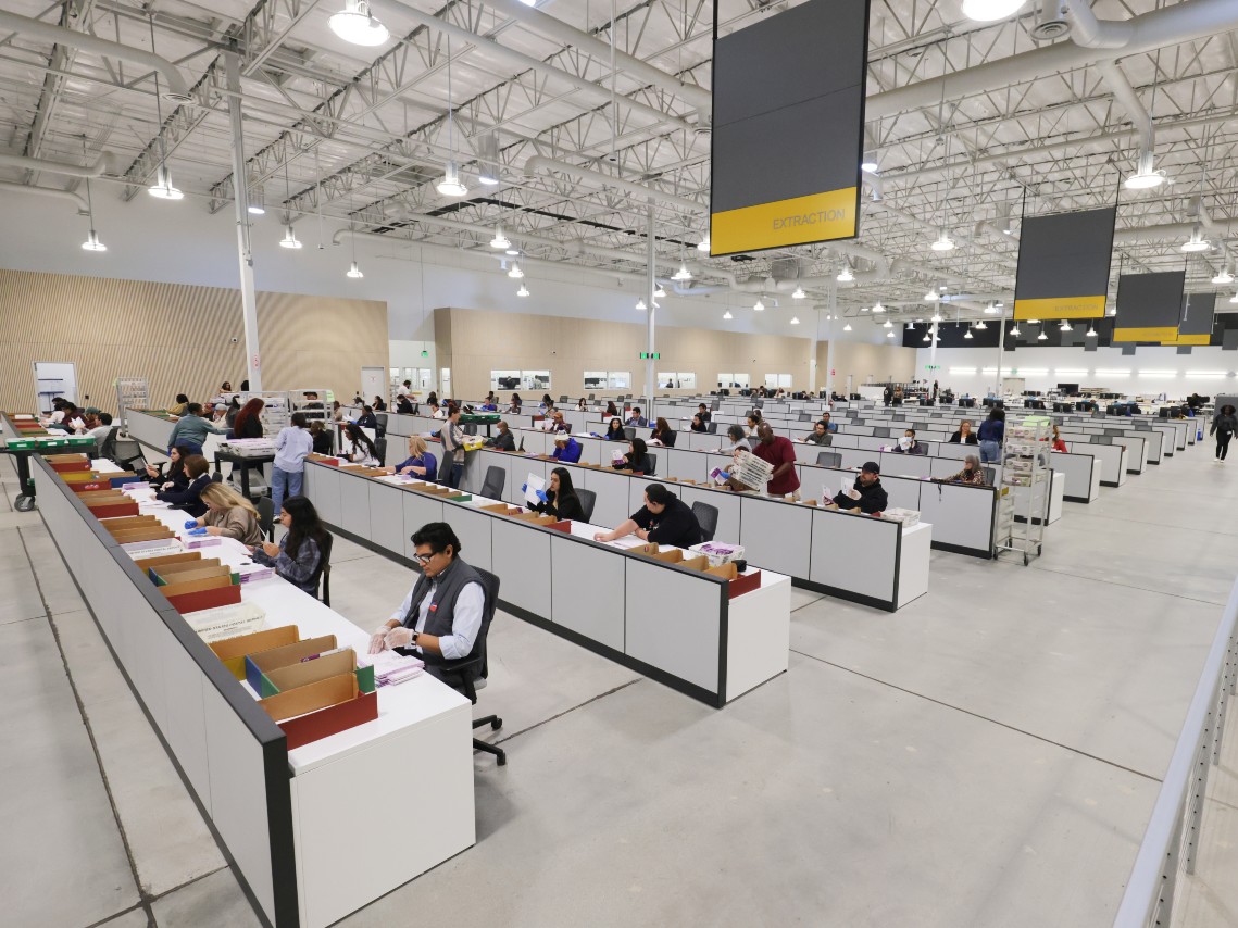 Workers sort through ballots at the L.A. County Ballot Processing Center on Tuesday, Nov. 4, 2025, in City of Industry, Calif.