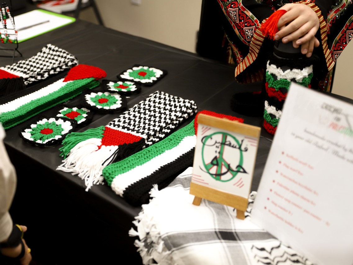 The "100 Years of Palestine" exhibit includes displays about Palestinian symbolism and culture, such as the watermelon and the traditional headscarf known as the keffiyeh.