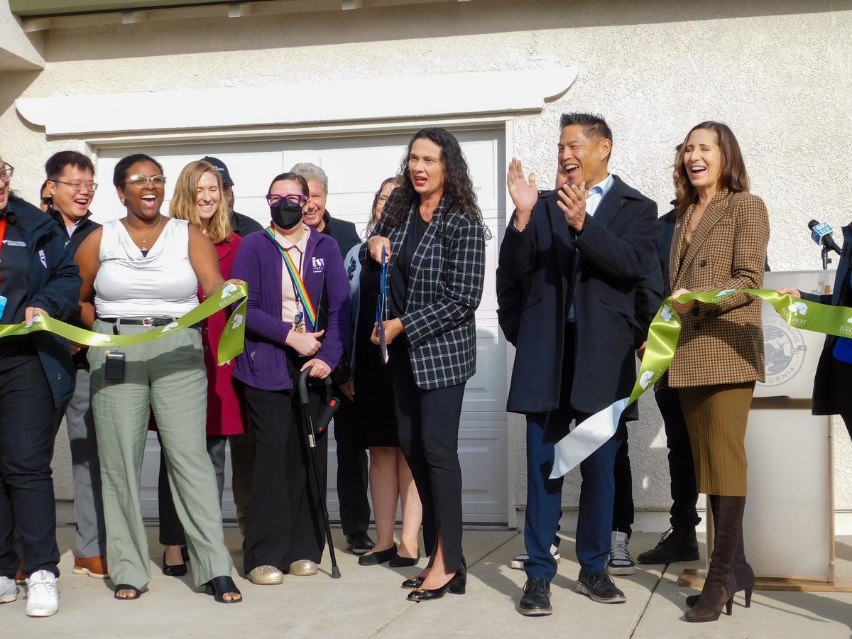 Mayor of Elk Grove Bobbie Singh-Allen along with the staff and Volunteers of America cutting the ribbon for the finished project of Adamstown House after the press conference Dec. 3, 2025.