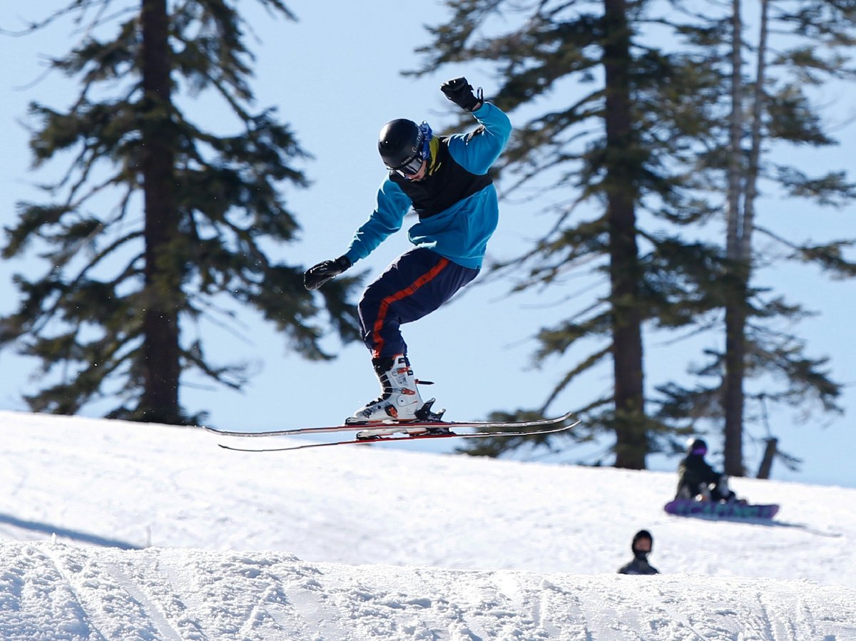 A skier makes a jump at the Sierra At Tahoe ski resort near Echo Summit , Calif., Thursday, Jan. 30, 2020.