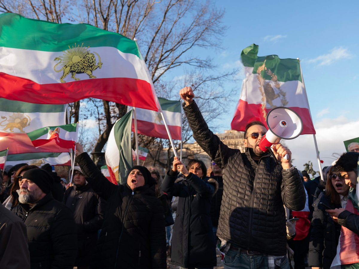 Activists take part in a rally supporting protesters in Iran at Lafayette Park, across from the White House, in Washington, Sunday, Jan. 11, 2026.