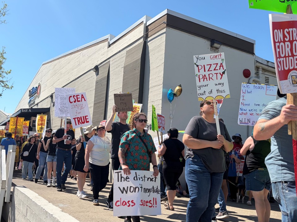 Teachers and supporters rally outside the Twin Rivers Unified School District offices in McClellan Park, Calif., on Friday, March 20, 2026, the 12th and final day of the strike.