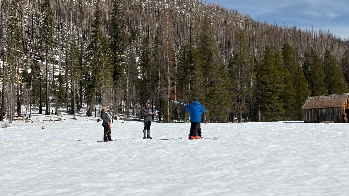 A team from the California Department of Water Resources conduct a snow survey at Phillips Station near Echo Summit on Feb. 27, 2026. The survey found the Sierra snowpack at 47% of average.