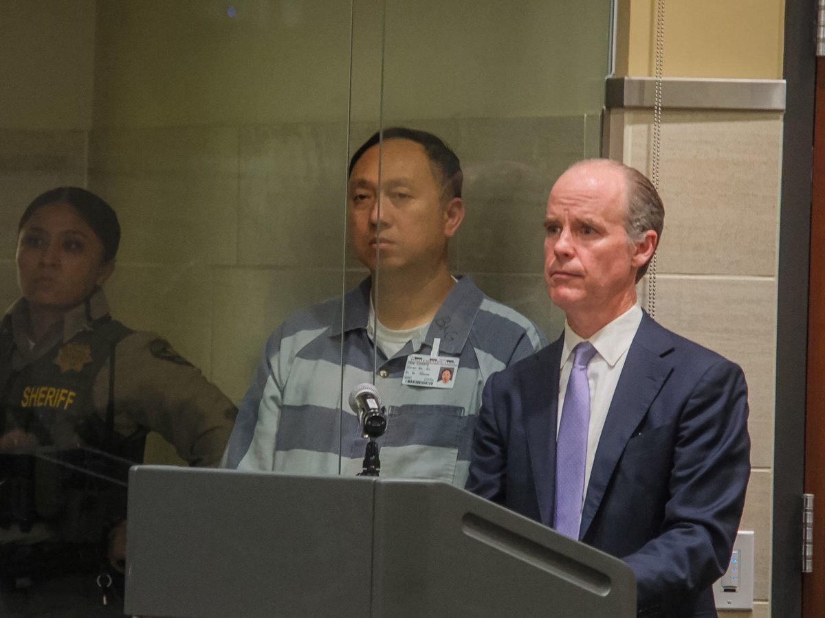 Kenneth Chee (center), owner of Devastating Pyrotechnics, makes his first appearance in Yolo County court after being indicted in connection to the deadly July 1 Esparto fireworks explosion Thursday, April 23, 2026 in Woodland.