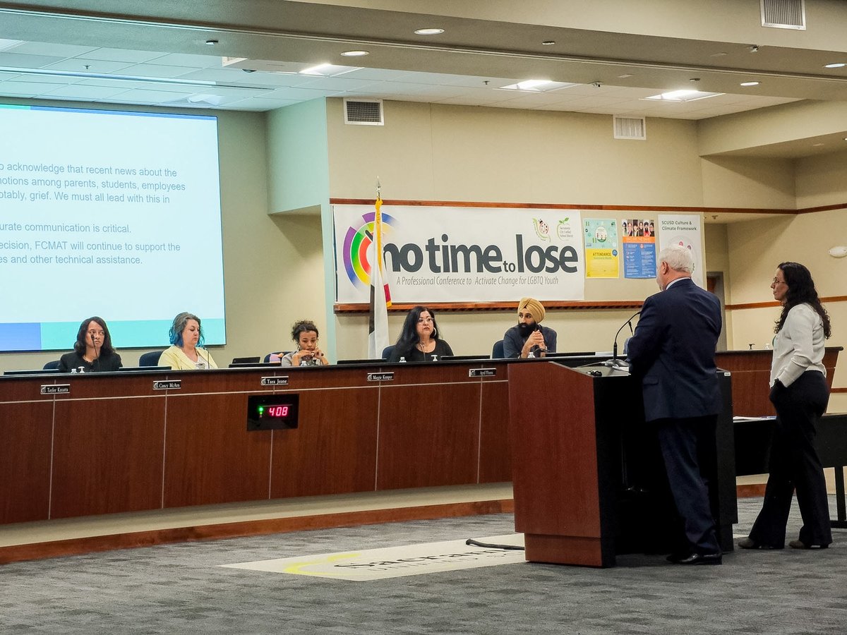 Michael Fine stands at a podium and gives a presentation to the Sacramento City Unified School District on May 7th, 2026.