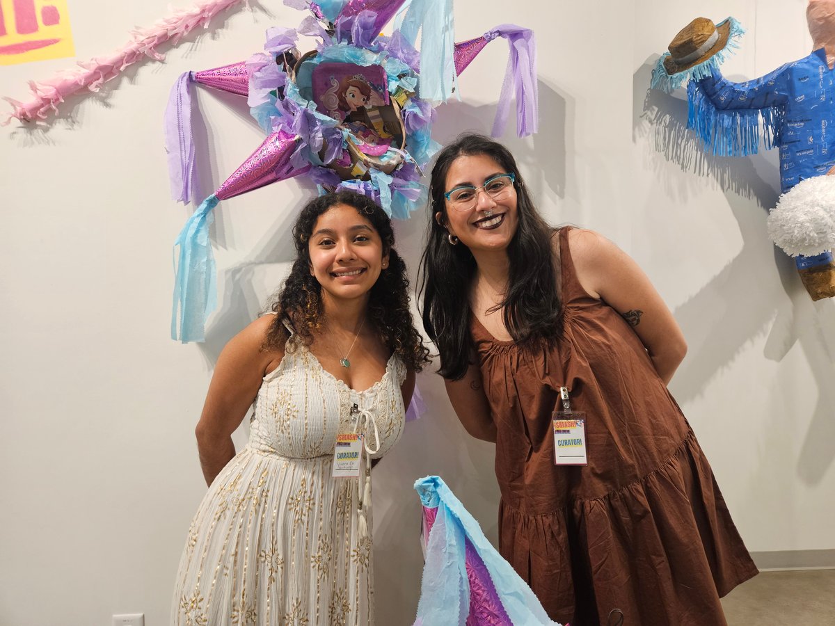 Vianne De Santiago (left) and Bridgett Rex (right) are the curators of SMASH! A Piñata Exhibition, which showcases the symbolism and diversity of piñatas as an art form in an unconventional setting. The exhibit runs through May 30.