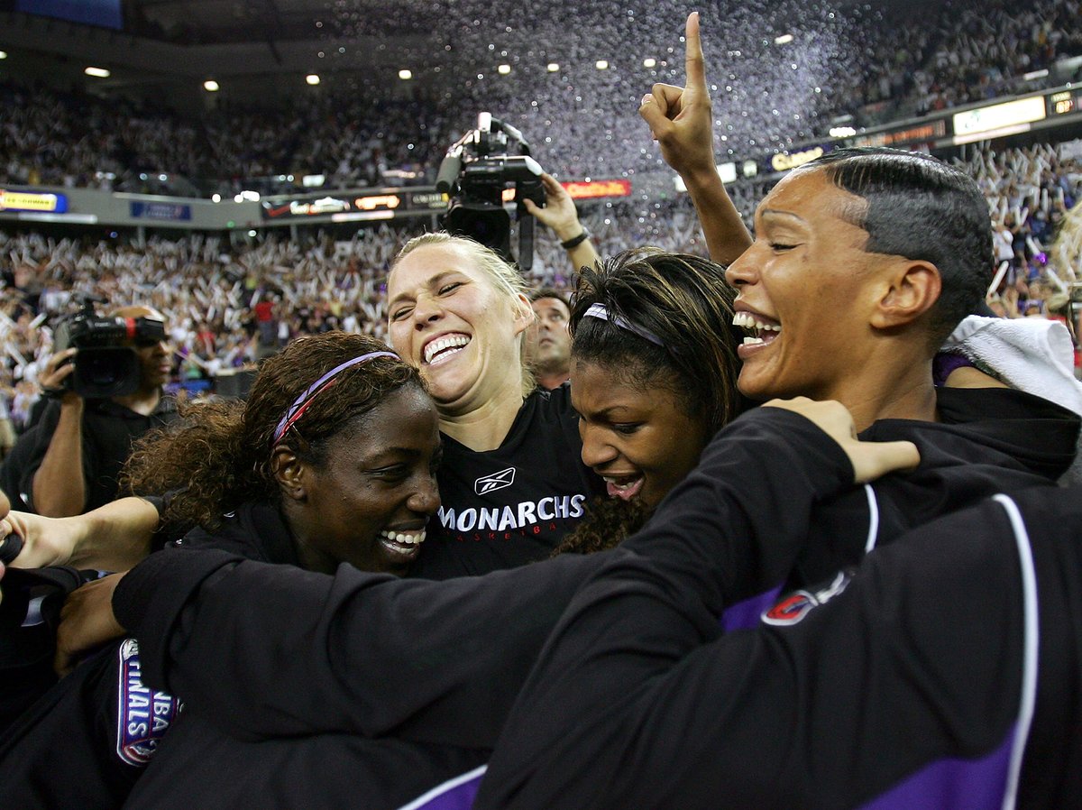 Olympia Scott-Richardson, DeMya Walker, Erin Buescher and Hamchetou Maiga of the Sacramento Monarchs celebrate after defeating the Connecticut Sun during Game 4 of the WNBA Finals September 20, 2005 at Arco Arena in Sacramento, California.