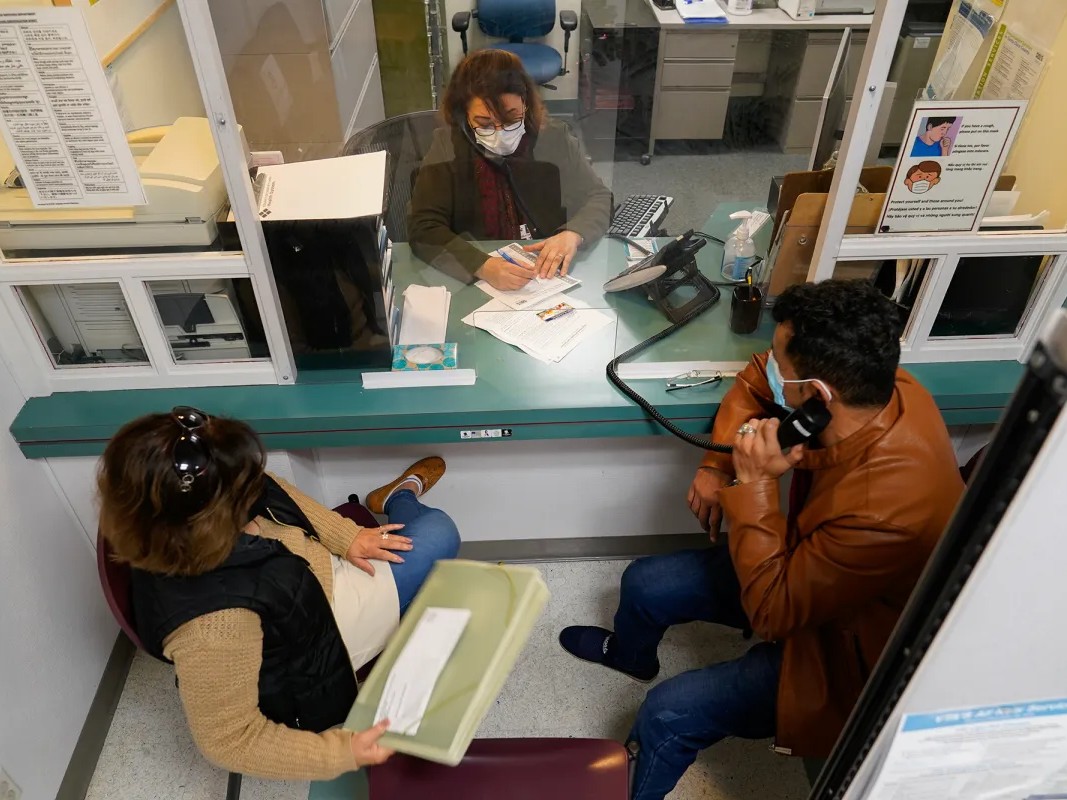 Patients make a doctor's appointment at the Santa Clara Valley Health Center in San Jose on Dec. 9, 2021.
