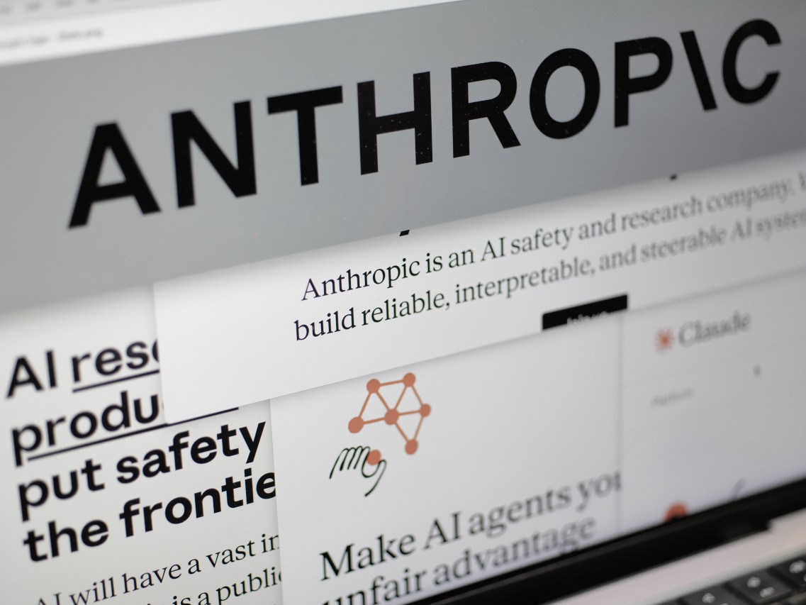 FILE - Pages from the Anthropic website and the company's logo are displayed on a computer screen in New York, Feb. 26, 2026.