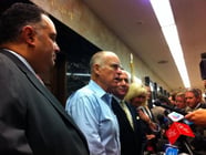 Gov. Jerry Brown and California legislative leaders announce a prisons deal outside the governor's office at the State Capitol Monday.