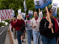 Teachers strike outside McClatchy High School on April 11, 2019.