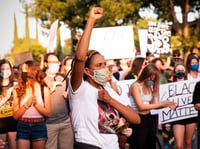 Black Lives Matter Sacramento protesters march down Richards Boulevard in Sacramento on Aug. 1, 2020.