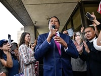 Conservative radio talk show host Larry Elder, talks to his supporters at a rally in Norwalk, on July 13, 2021. Elder announced his bid as a recall candidate for governor of California.