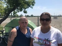 Unhoused residents Angela Anderson [left] and Ruby Lozoya said the county’s tiny home village concept in South Sacramento would be safer than their current residence at a cityisanctioned tent encampment at Miller Regional Park.