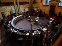 Members of the Task Force to Study and Develop Reparation Proposals for African Americans listen to public comment during a meeting in Oakland, Calif., Wednesday, Dec. 14, 2022.