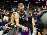 Sacramento Kings forward Domantas Sabonis (10) celebrates lighting the beam following an NBA basketball game against the Los Angeles Clippers in Sacramento, Calif., Friday, March 3, 2023.