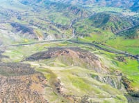 An aerial photo shows the Bear Creek basin that includes the intersection of Highways 16 and 20, near Molok Luyuk.