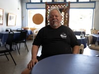 Art Luna sits for a portrait in his cafe, Luna's Cafe and Juice Bar, in Sacramento, Calif, on Thurs., July 27, 2023.