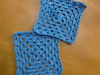 The first squares produced as part of CapRadio's temperature blanket, depicting average temperature in January of 2024.