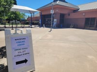 A sign points to the cooling center at Wackford Community Center in Elk Grove, Calif. on July 2, 2024.