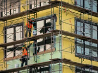 Construction, like at this West Oakland project, is among the industries experts say will be most impacted by mass deportations.