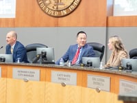 City Manager Howard Chan (right) sits at the dais next to Mayor Kevin McCarty (left) and Councilmember Caity Maple Tuesday, Dec. 10, 2024, at Sacramento City hall.