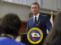 California Gov. Gavin Newsom listens to a reporter's question as he outlines his proposed 2025-2 $322 billion state budget during a news conference at California State University, Stanislaus in Turlock, Calif., Monday, Jan. 6, 2025.