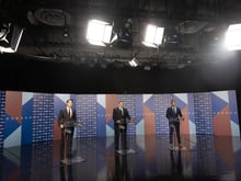 (from left) Assembly member Kevin Kiley, Sacramento Sheriff Scott Jones and Dr. Kermit Jones take part in a U.S. House District 3 debate hosted by CapRadio and KCRA 3 on Tuesday, May 31, 2022.