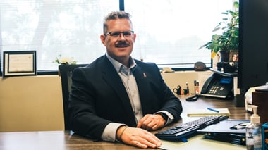 Jacob Bradley-Rowe, CEO of Sunburst Projects, in his office.