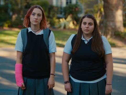Saoirse Ronan (left) and Beanie Feldstein play best friends in Lady Bird.

