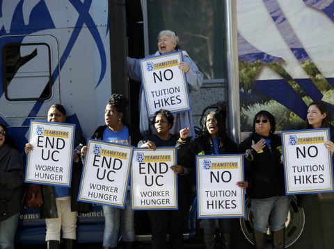 In this Wed., Jan. 25, 2017 file photo, University of California employees, who are also members of the Teamsters Local 210, shout in protest against cuts in their benefits and tuition hikes.